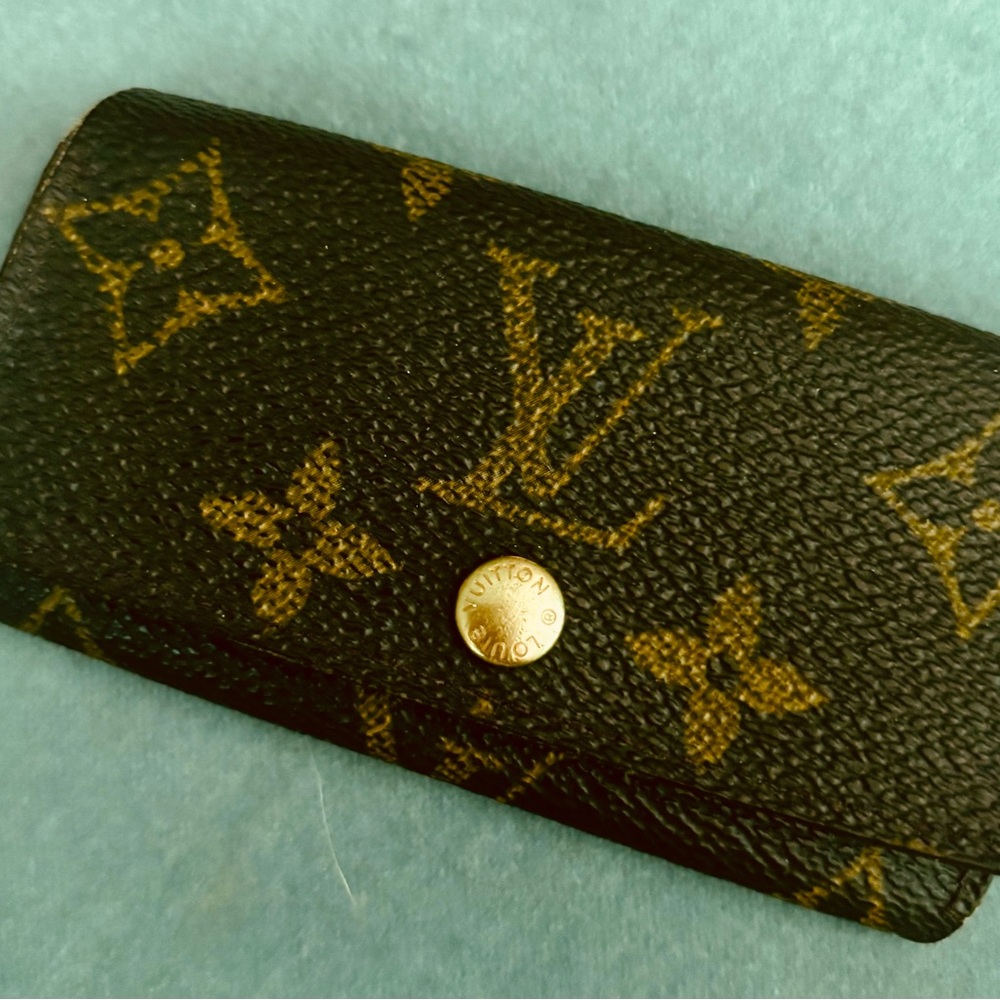 Louis Vuitton Brown and Gold Monogram Detail